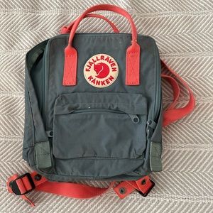 fjall raven mini backpack in blue and pink